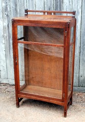 Charles Limbert single door china cabinet.